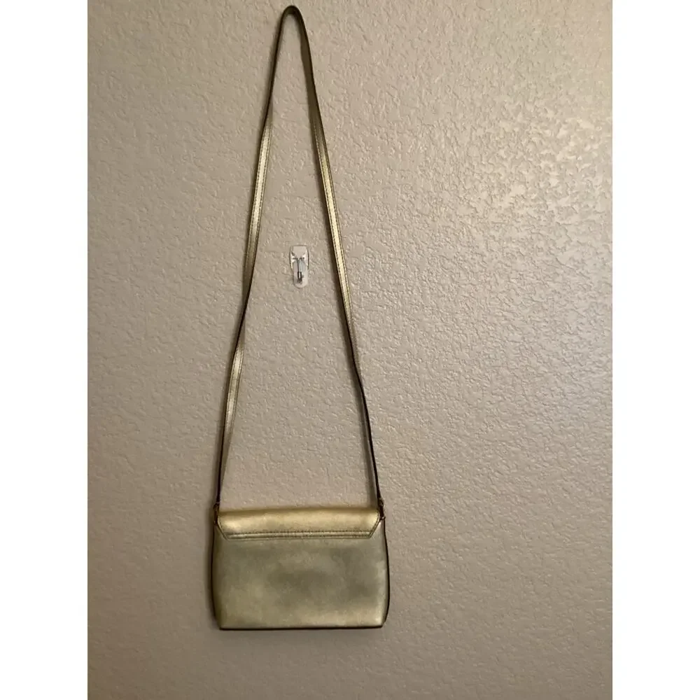 Kate Spade New York Newbury Lane Sally Crossbody bag in metallic gold